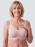 Soutien-gorge Lisière MUE en rose poudré clair, porté de face