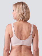Soutien-gorge Lisière MUE en rose poudré clair, vu de dos, bretelles réglables et agrafes centrales